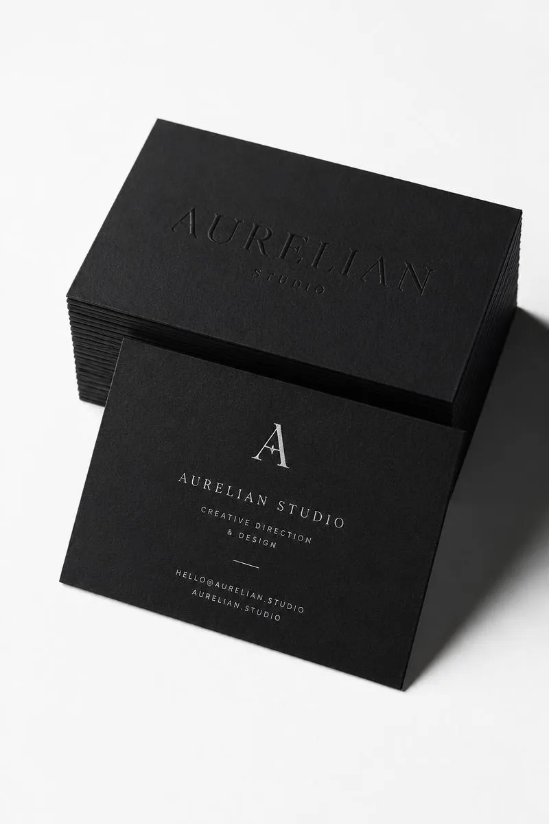 Embossed matte black brand stationery designed by Zero